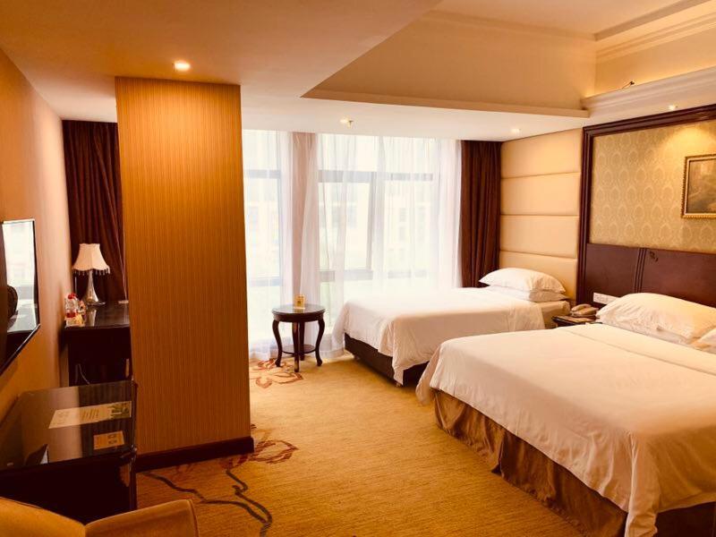 Vienna Hotel Shanghai Happy Valley Songjiang Buitenkant foto